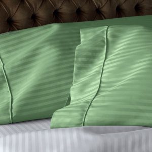 a pair of apple green pillowcases