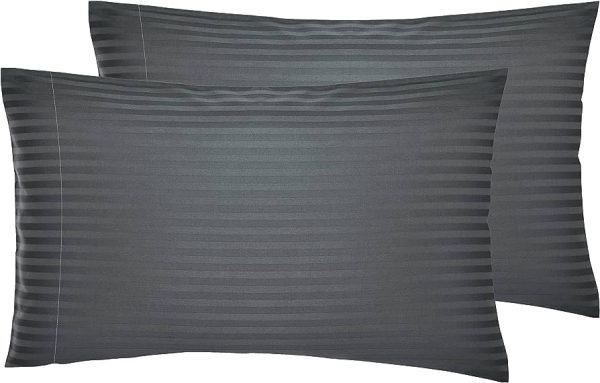 a pair of charcoal grey pillowcases