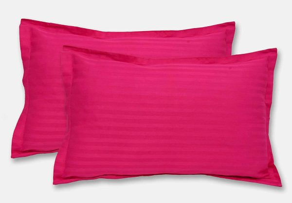 a pair of hot pink pillowcases