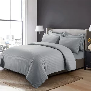 light grey bedsheet and pillows