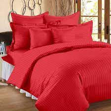 coral red bedsheet and pillows